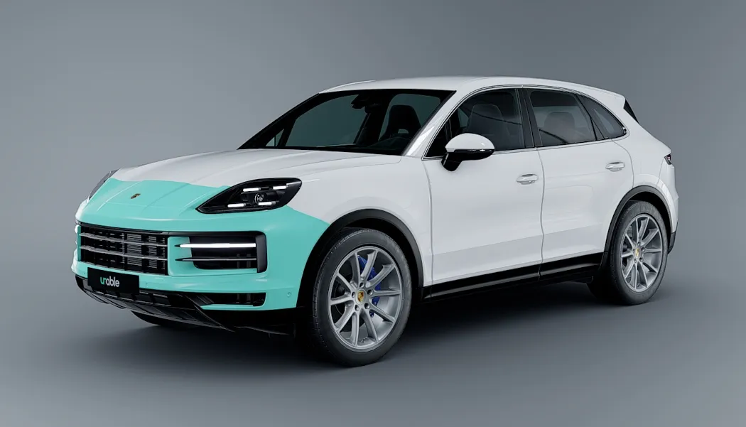 Render of a white Porsche Cayenne with the front bumper, the leading edge of the hood, the front of the fenders, and the mirrors highlighted in teal to show partial front PPF coverage