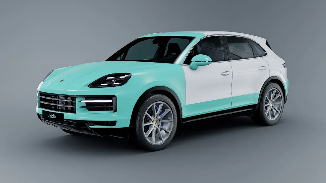 Render of a white Porsche Cayenne with the full front, A-pillars, roof edge, rocker panels, and the panels ahead of the rear wheels highlighted in teal to show track package PPF coverage