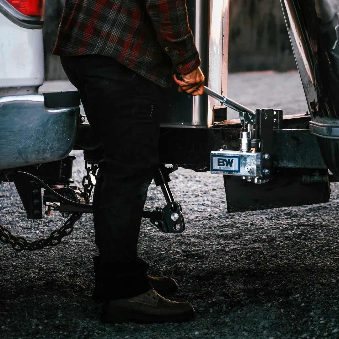 A weight distribution hitch hooked up between a truck and trailer (Weigh Safe photo)